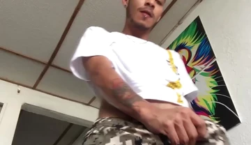 Tattooed Latino amateur Juan jerks off his big dick and cums