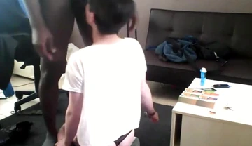 Black femboy sucks and fucks interracially